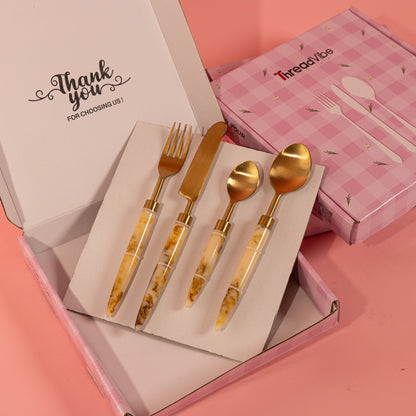 White Coated Gold Cutlery-Set Of 4